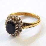 Gold, sapphire and diamond cluster ring, marks worn, 4.3g in total