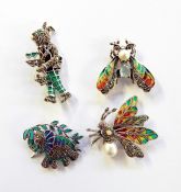 Four silver marcasite and plique a jour brooches, three with pendant attachments, to include