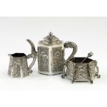 Late 19th/early 20th century Chinese silver tea service of three pieces, viz:- hexagonal teapot,