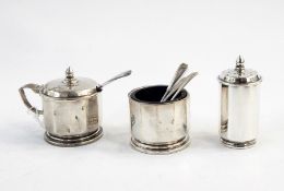 Four-piece cruet set with blue glass liners, H&H Birmingham and a Sheffield silver pepperette, the
