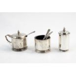 Four-piece cruet set with blue glass liners, H&H Birmingham and a Sheffield silver pepperette, the