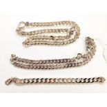 Five assorted silver necklaces and bracelets, 14 troy oz/435g