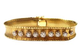 18K gold and diamond bracelet, the matt finish segmented bracelet set with nine graduated