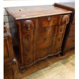 Continental figured walnut serpentine-fronted chest, the top cross-banded with quadrant mould