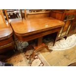 Regency brass inlaid rosewood foldover swivel top card table, having curved corners, brass line