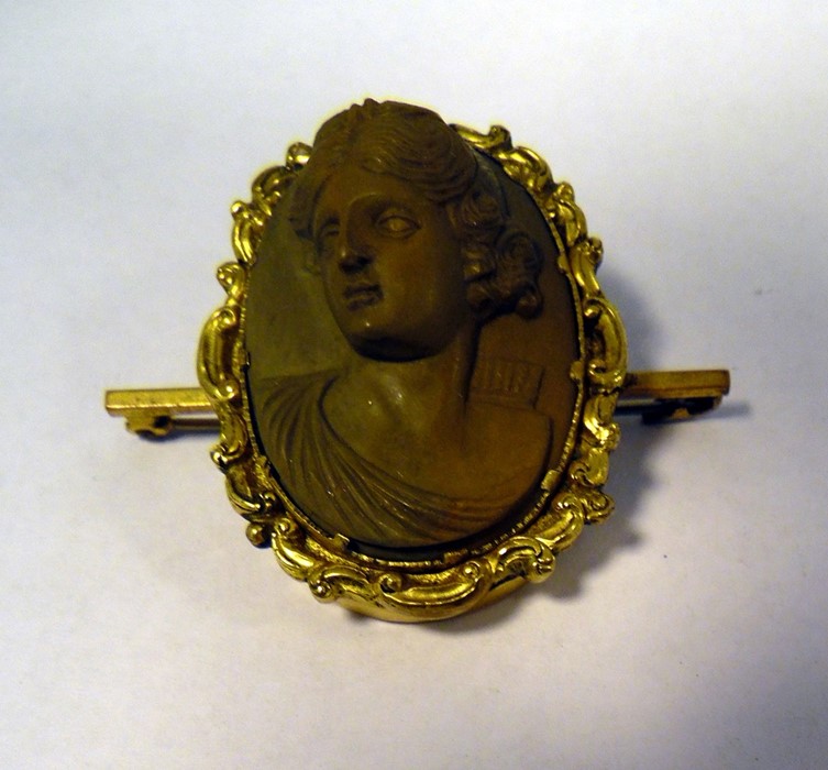 Victorian lava cameo brooch, oval with female classical head and shoulders portrait in relief and