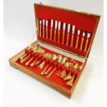 Canteen 'Eetrite' 24 carat plated "Fleur" and a boxed set of fish knives and forks, six place
