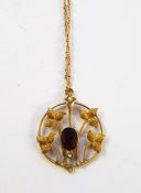 Edwardian 9ct gold, garnet and seedpearl pendant and a gold-coloured ornate fine chain