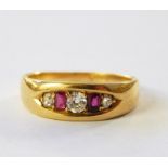 18ct gold, ruby and diamond ring set three diamonds and two pink stones in elliptical setting