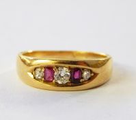 18ct gold, ruby and diamond ring set three diamonds and two pink stones in elliptical setting