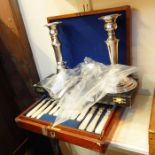 Pair of silver plated candlesticks, six silver plated  soup spoons, an EPNS fish knife and fork with
