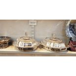 Pair of EPNS lidded entree dishes, gadrooned decoration with removable handles to create four dishes