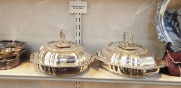 Pair of EPNS lidded entree dishes, gadrooned decoration with removable handles to create four dishes