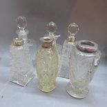 Six cut glass perfume bottles,