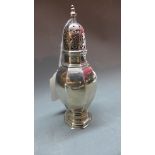 A hallmarked silver sugar sifter, London 1905, H:15.