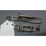 A cased silver trumpet, marked 925, together with a silver trombone, marked 925,