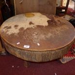 A cow leather African drum,