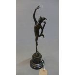 After Giambologna, a bronze study of Mercury standing on the mouth of the God Zephyrus,