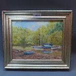 A 20th Century oil on canvas depicting boats by a river,