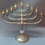 A silver menorah, stamped 925, H.