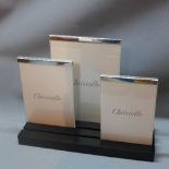 A set of three Christofle silver plated standing photo frames