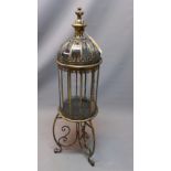 A contemporary brass storm lantern on stand.