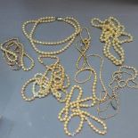 Nine vintage pearl necklaces.
