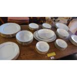 A contemporary Noritake fine bone china part dinner set, comprising plates, side plates,