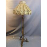 An Arts and Crafts brass and copper standard lamp (with shade)