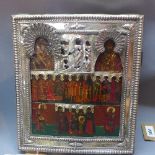 A Russian icon depicting Saints and the Mother of God, tempera on wooden panel with silver oklad,