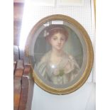 A 19th century school, head and shoulder portrait of a lady, pastel, within oval giltwood frame,
