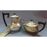 Two matching early 20th century silver teapots, hallmarked Sheffield, maker Edward Viner