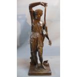 A Resin figural study of the Mattei Amazon, carrying a bow and sheath and is resting on her Pelta (