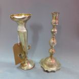 A silver epergne, together with a silver candlestick. H.25cm