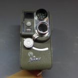 A vintage German Nizo Exposomat 8T roll loading film camera, c.1950s, no. C28829