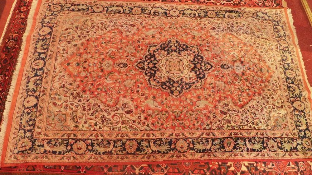 A North West Persian carpet with central floral medallion surrounded by repeating floral motifs - Image 2 of 5