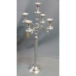 A contemporary chrome floor standing candelabra