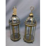 A pair of large storm lanterns, H. 78cm