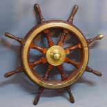 A 19th century brass mounted oak ship's wheel, having eight spokes, 80cm diameter