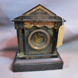 A late 19th century slate mantle clock, the architectural case with marble detailing, the visible