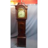 An early 19th century mahogany longcase clock, with eight day movement, the arched dial painted with