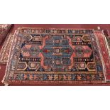 An extremely fine North West Persian Heriz rug, with central diamond medallion on blue field