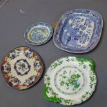 Three Victorian ceramic platters together with a ceramic plate