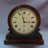 A 19th century mahogany mantle clock by John Walker, the round enamel dial with roman numerals,