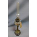 A 19th century brass oil lamp