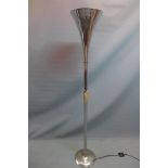 A chrome standard lamp having flared rim, raised on circular base, H. 173cm