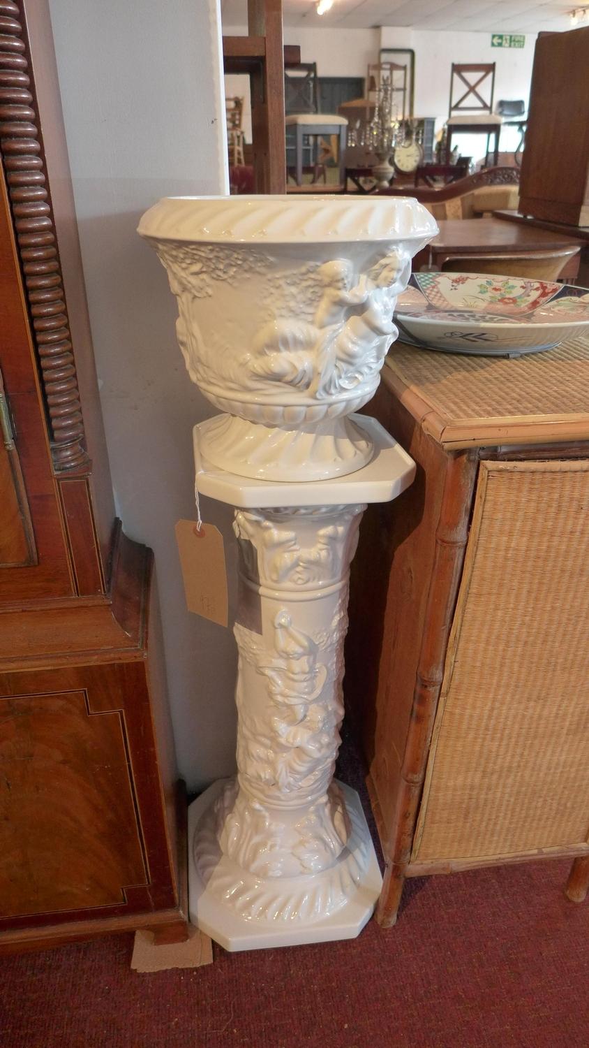 A ceramic white Jardiniere stand H.49cm