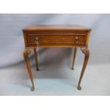 An early 20th century burr walnut concave side table with single drawer raised on cabriole legs. H-