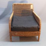 A rattan arm chair