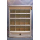 A 20th century white painted open bookcase raised on plinth base. H-130 W-100 D-30cm